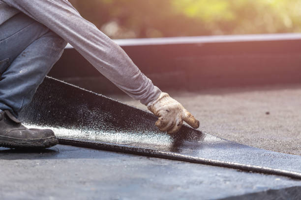 Professional Basement Waterproofing technician working in Newtown, PA